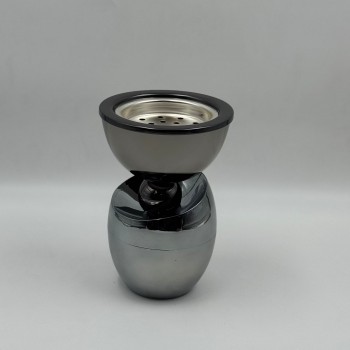 مبخرة أنيقة بتصميم عصري وفاخر، مصنوعة من المعدن بلون الرمادي يعكس الذوق الراقي.19×13×13سم 