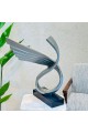 تحفة فنية بتصميم عصري فاخر مستوحى من حركة الأجنحة والانسياب في الشكل، 70×55×15سم 