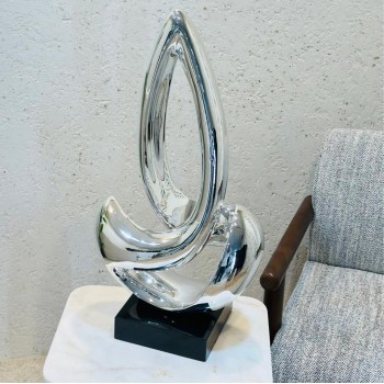 تحفة فنية بتصميم عصري فاخر مستوحى من حركة الأجنحة والانسياب في الشكل، 70×55×15سم 