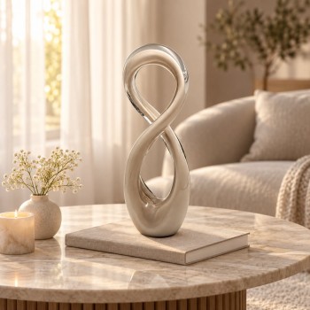 تحفة فنية زجاجية بتصميم انسيابي مستوحى من رمز اللانهاية49×15×9سم 