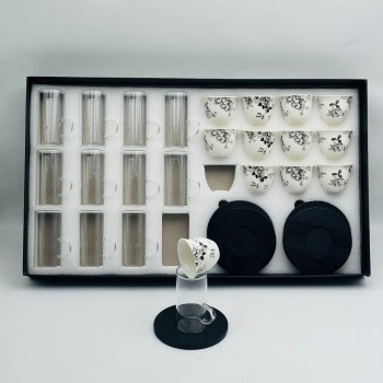 36-piece glass hospitality cup set featuring geometric details and circular bases.