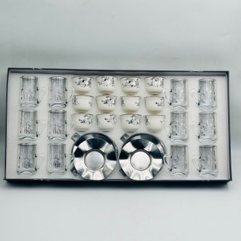 36-piece tea and coffee hospitality set featuring a glass design and elegant calligraphic patterns. 36-piece tea and coffee hospitality set featuring a glass design and elegant calligraphic patterns.