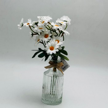 Premium artificial chrysanthemum stems with a decorative glass vase for home décor. Premium artificial chrysanthemum stems with a decorative glass vase for home décor.